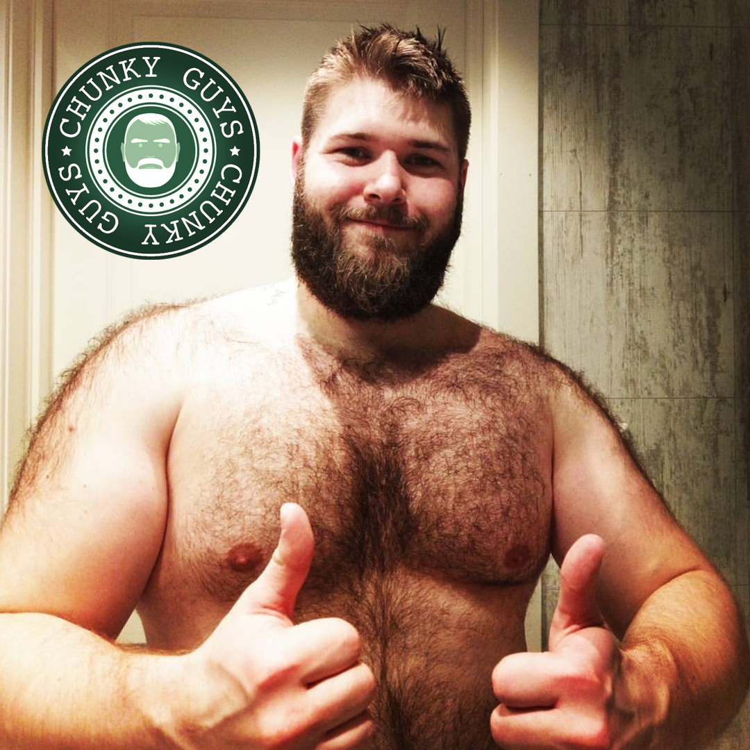 Young bearded hairy bear cub smiling and giving two thumbs-up