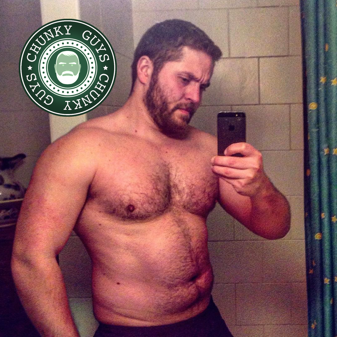 Chunky muscled hairy cub with beard takes a topless photo of himself in the mirror